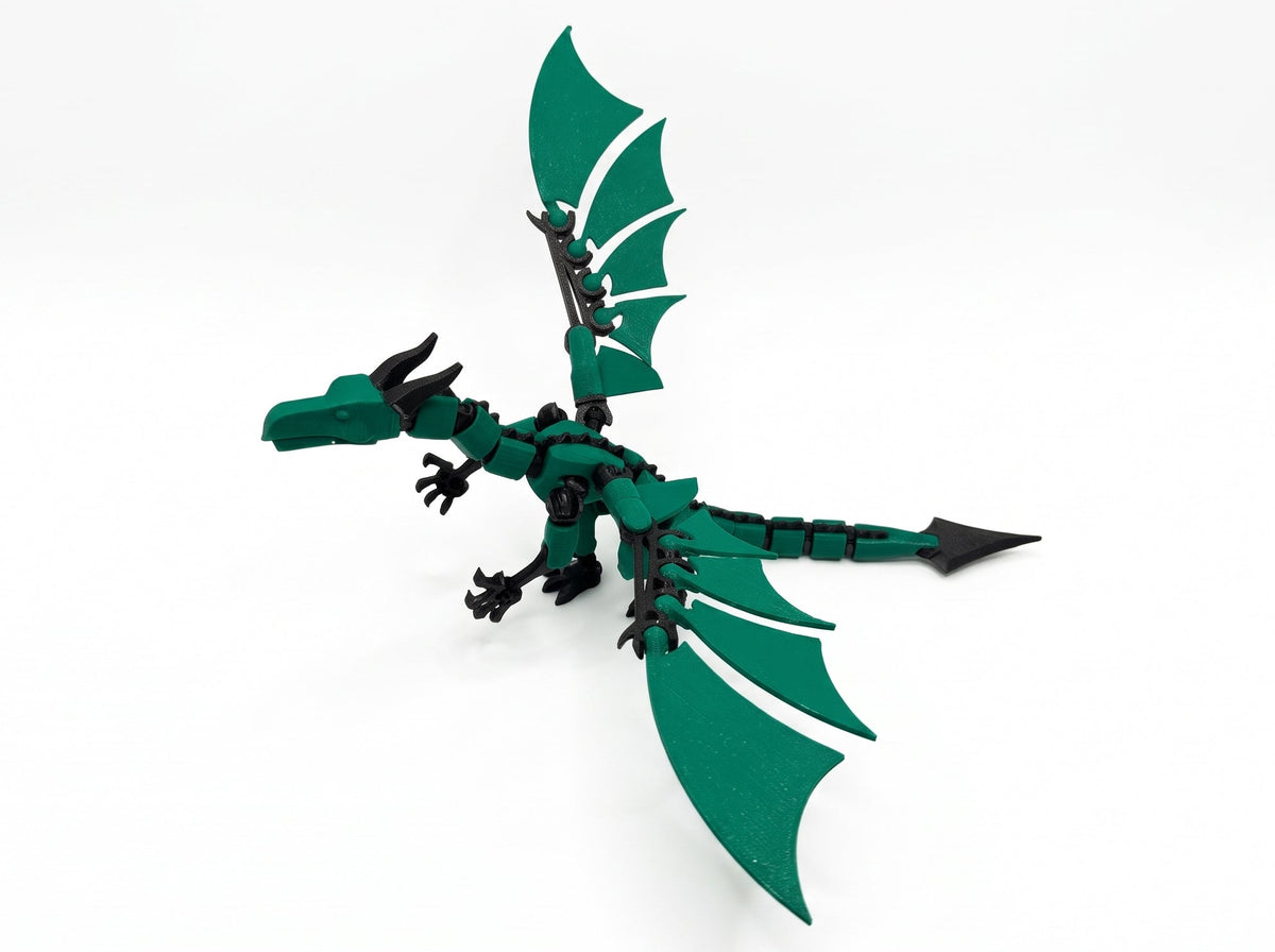 Angled view of a green and black articulated dragon figure with one wing raised.