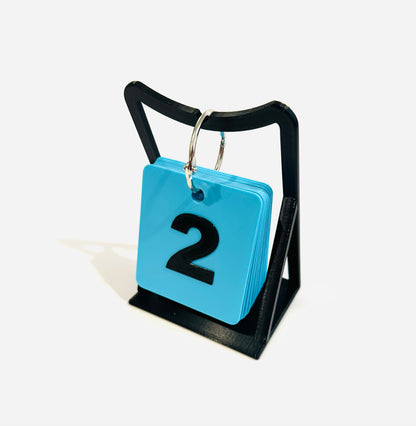 Wild Card Rotary with blue rotating rank cards on a metal ring and black tabletop bracket, displaying the number 2.
