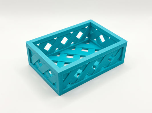 Small turquoise rectangular coin tray with an open lattice base and sides